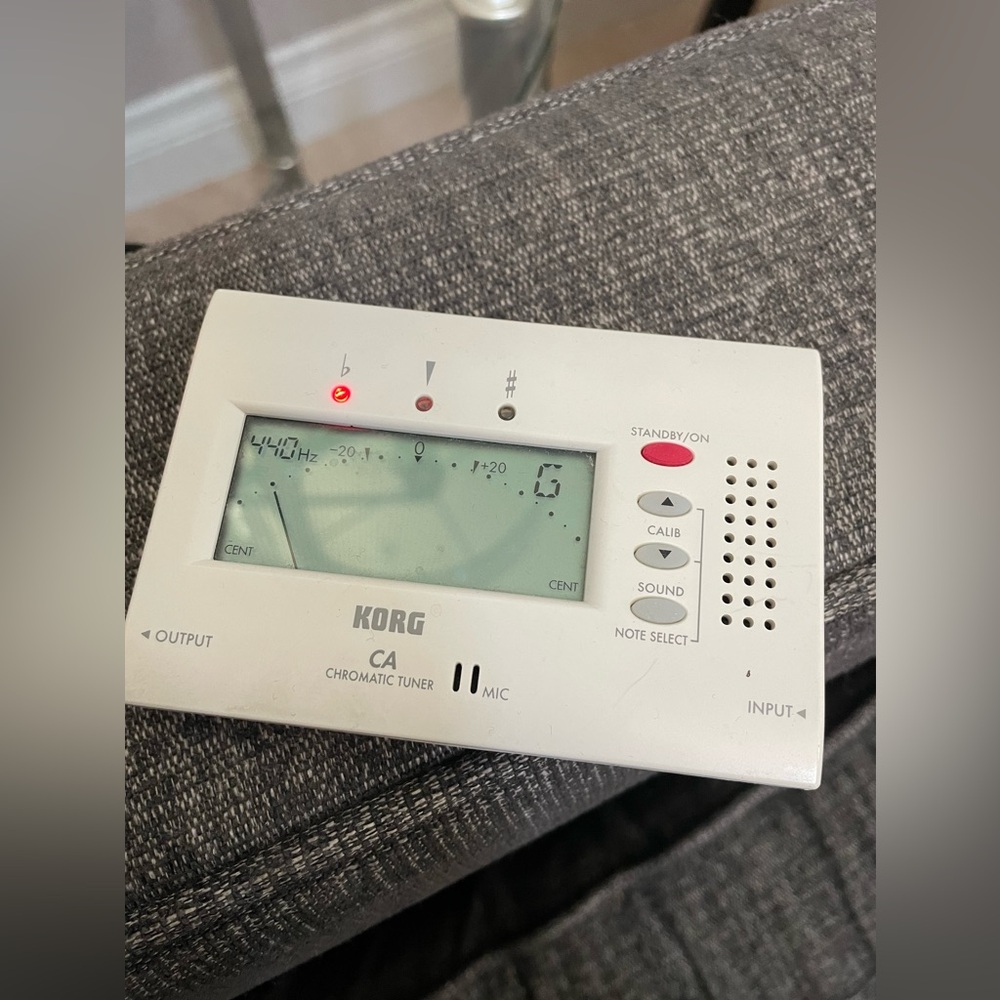 Guitar Tuner: Helps tune guitar